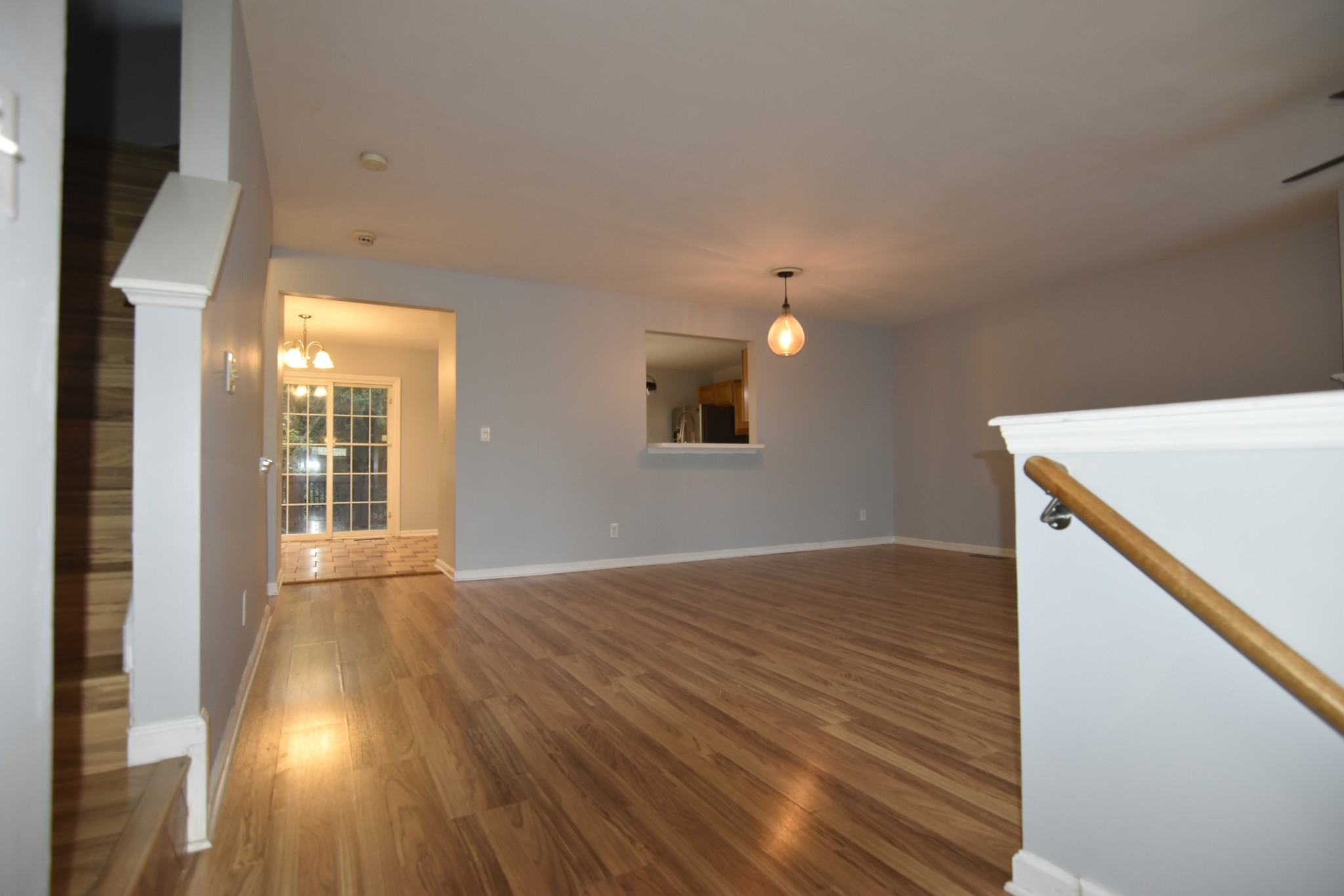 515 Huntington Ridge Drive Nashville, TN 37211 - Photo 8 of 42 a view of an empty room with wooden floor and a window