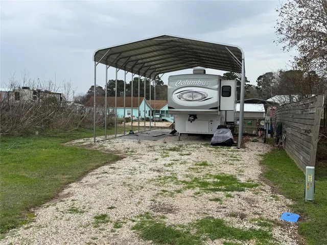a view of a car in front of a house