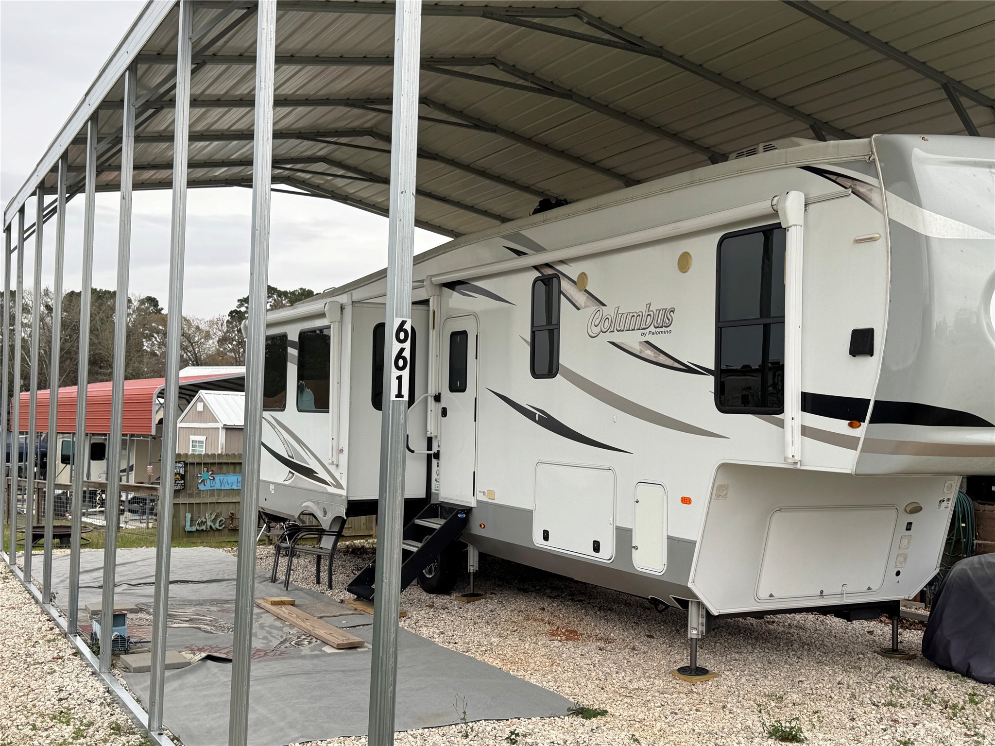 661 Lagoon Drive Point Blank, TX 77364 - Photo 3 of 14 a front view of a building with street view