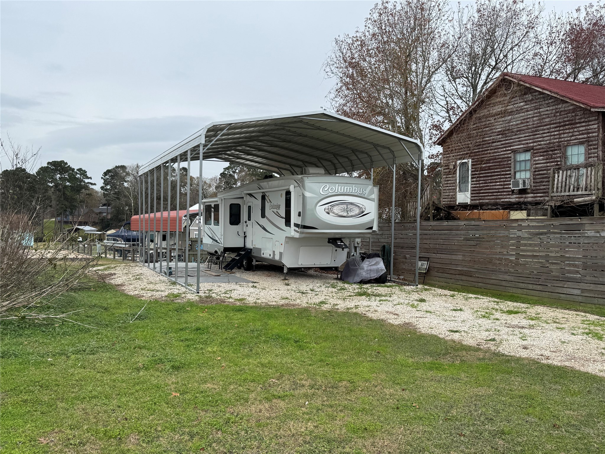 661 Lagoon Drive Point Blank, TX 77364 - Photo 9 of 14 a house view with a swimming pool