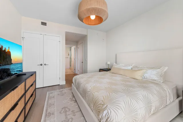 a bathroom with a double vanity sink mirror double and shower