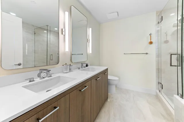 a bathroom with a tub and a shower