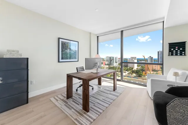 a close view of a utility room with dryer and washer