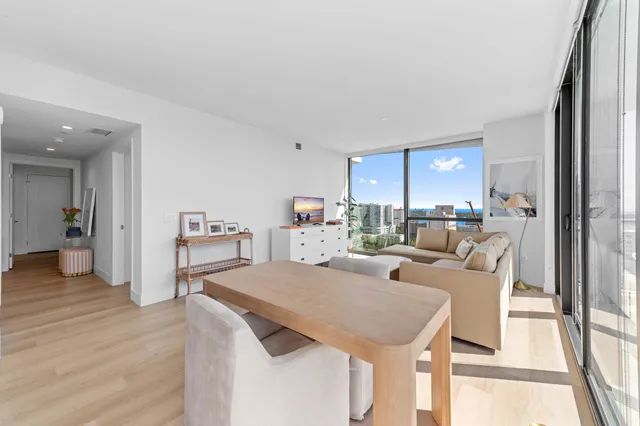 a living room with furniture and a table