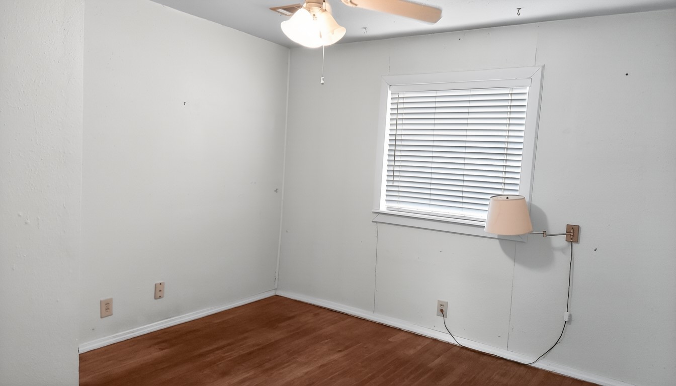 11913 McAngus Road Del Valle, TX 78617 - Photo 35 of 45 an empty room with a window