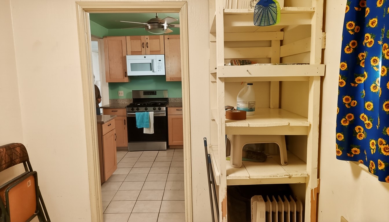 11913 McAngus Road Del Valle, TX 78617 - Photo 39 of 45 a en suite bathroom with a sink and a mirror