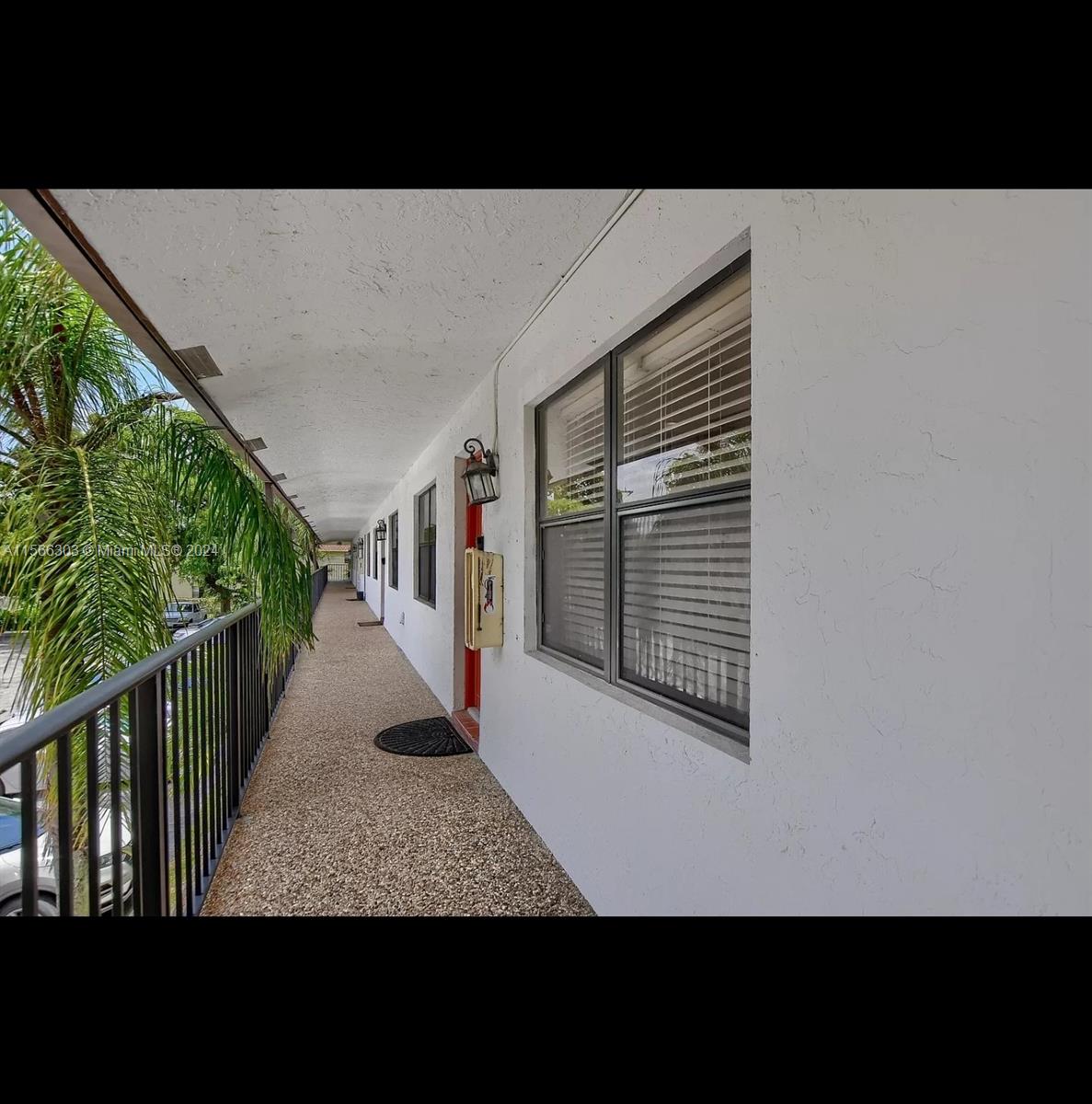 1501 Northwest 13th Street, Unit 15 Boca Raton, FL 33486 - Photo 4 of 14 a view of a balcony with an outdoor space