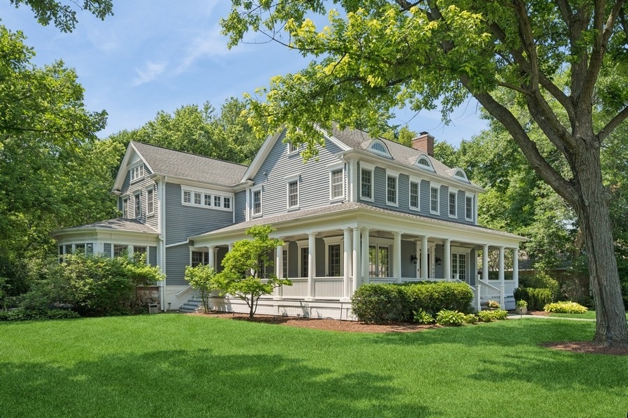 1025 Mohawk Road Wilmette, IL 60091 - Photo 39 of 47 a front view of a house with a garden