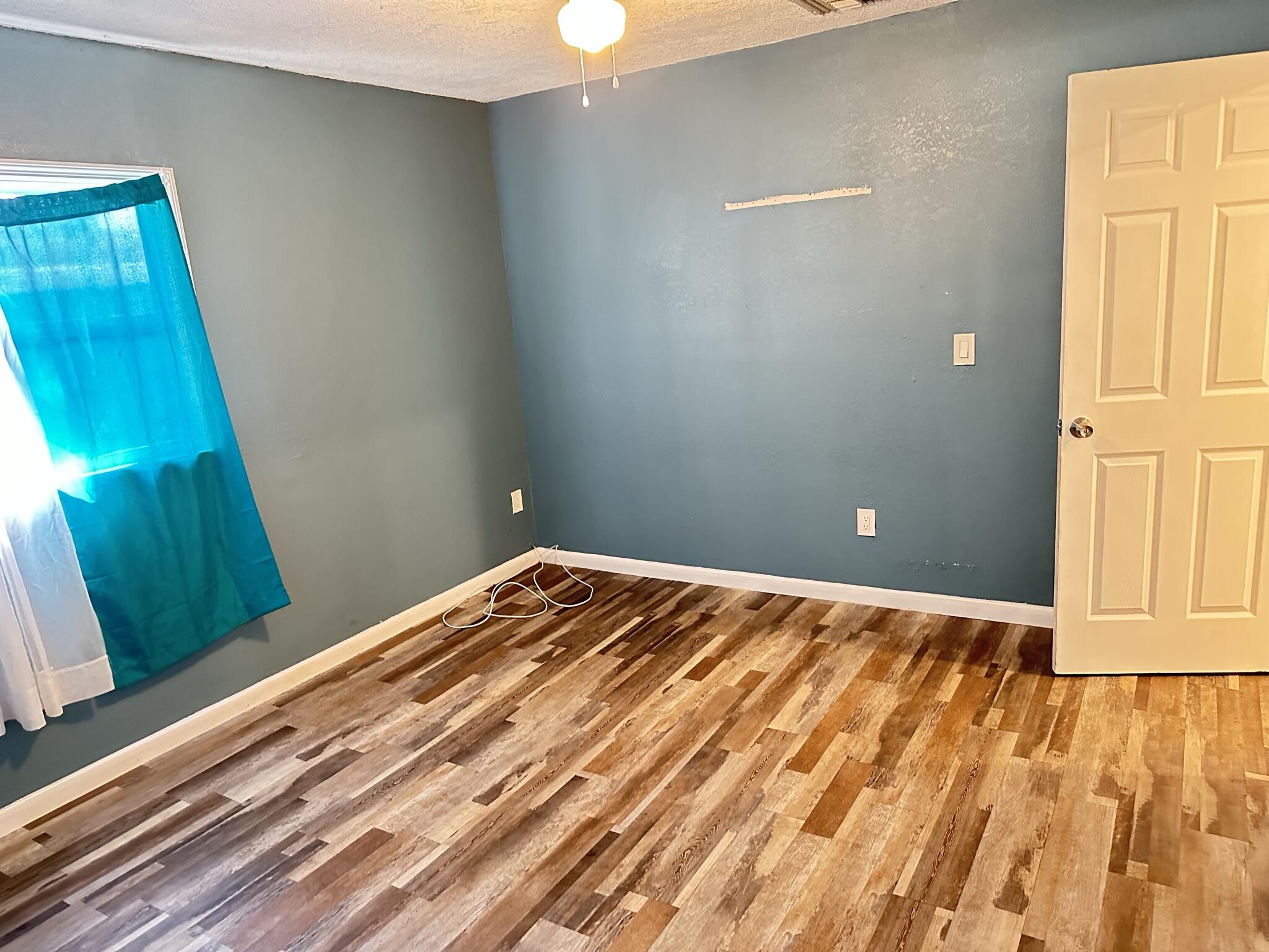 8534 Southeast Date Street Hobe Sound, FL 33455 - Photo 13 of 17 Master Bedroom