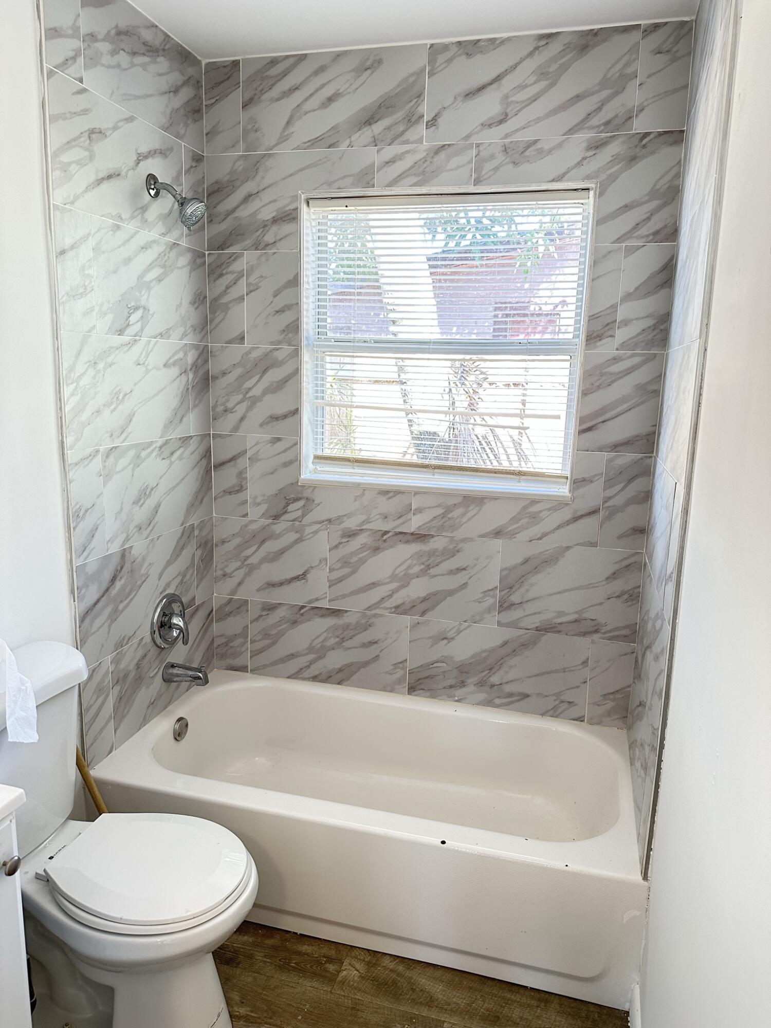 8534 Southeast Date Street Hobe Sound, FL 33455 - Photo 9 of 17 Guest Bath