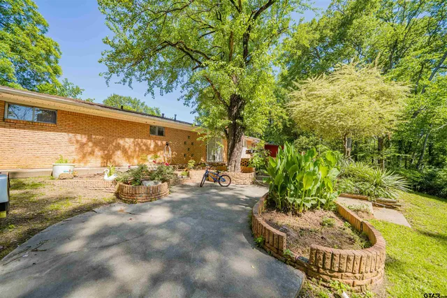 a view of a chairs and table in the patio