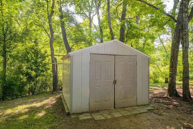 a house view with a backyard space