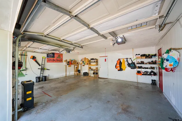 a view of a garage with storage