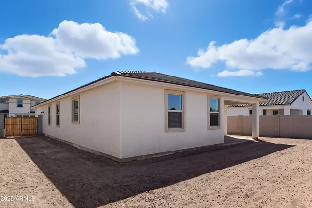 a view of a house with a street