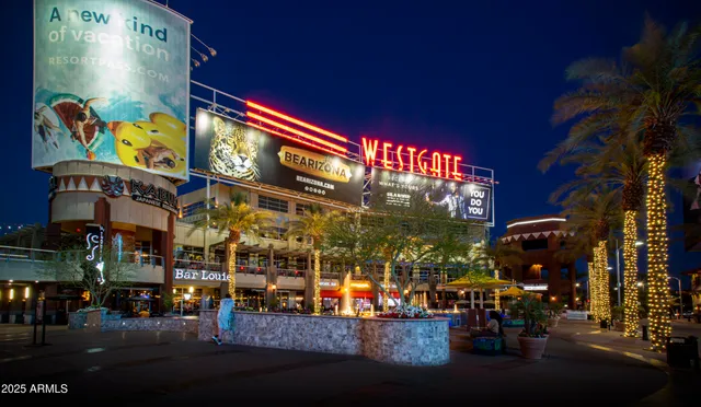 a group of people walking down a street