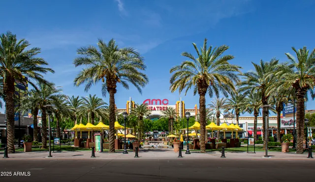 a view of multiple houses with a city view
