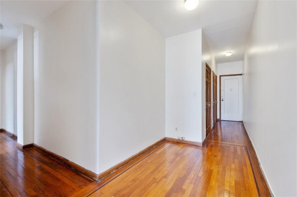 7119 Shore Road, Unit 2G Brooklyn, NY 11209 - Photo 11 of 22 a view of a room with wooden floor