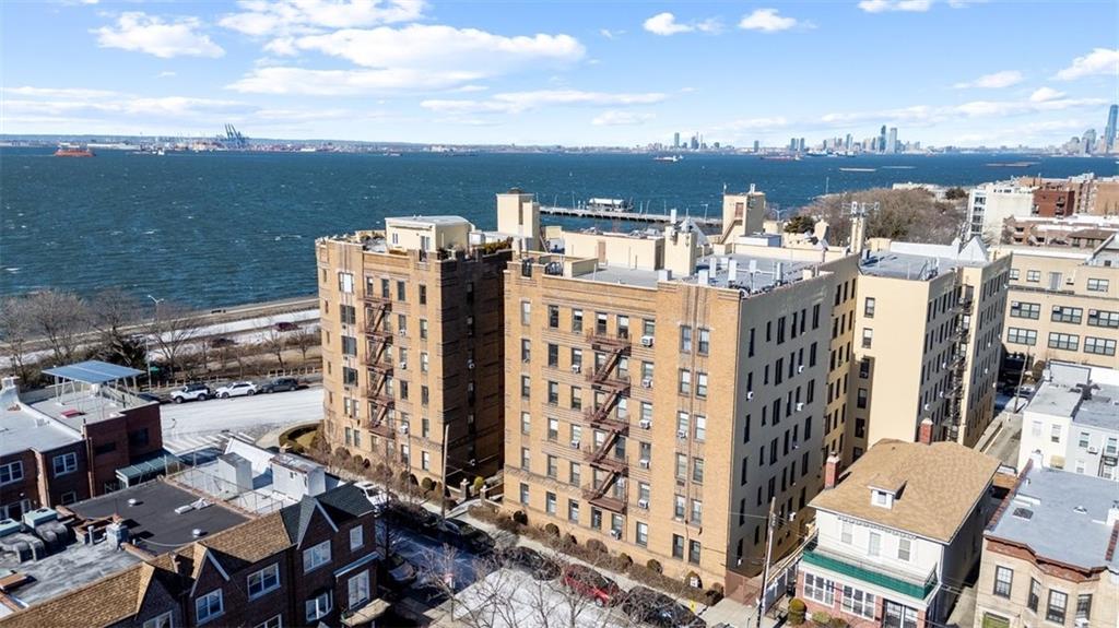 7119 Shore Road, Unit 2G Brooklyn, NY 11209 - Photo 17 of 22 a view of a city with tall buildings