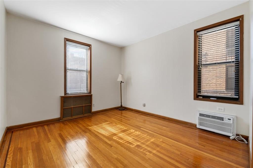 7119 Shore Road, Unit 2G Brooklyn, NY 11209 - Photo 8 of 22 a view of an empty room and window