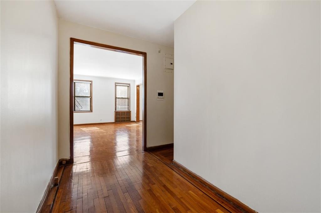 7119 Shore Road, Unit 2G Brooklyn, NY 11209 - Photo 10 of 22 a view of a hallway with wooden floor