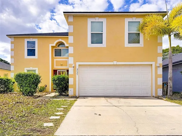 a front view of a house having yard