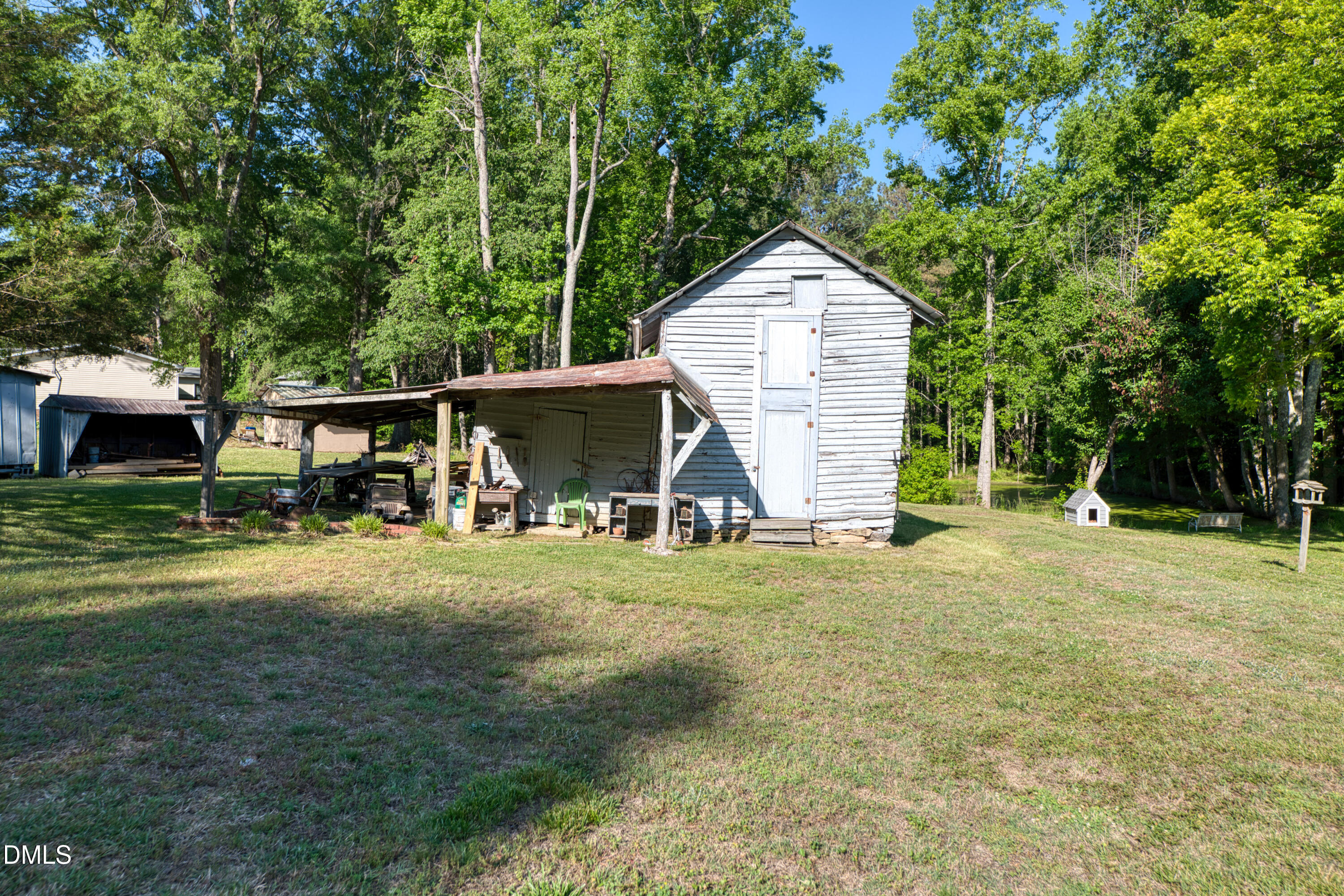 50 Robert Sledge Road Spring Hope, NC 27882 - Photo 27 of 50 a view of a house with a yard and tree