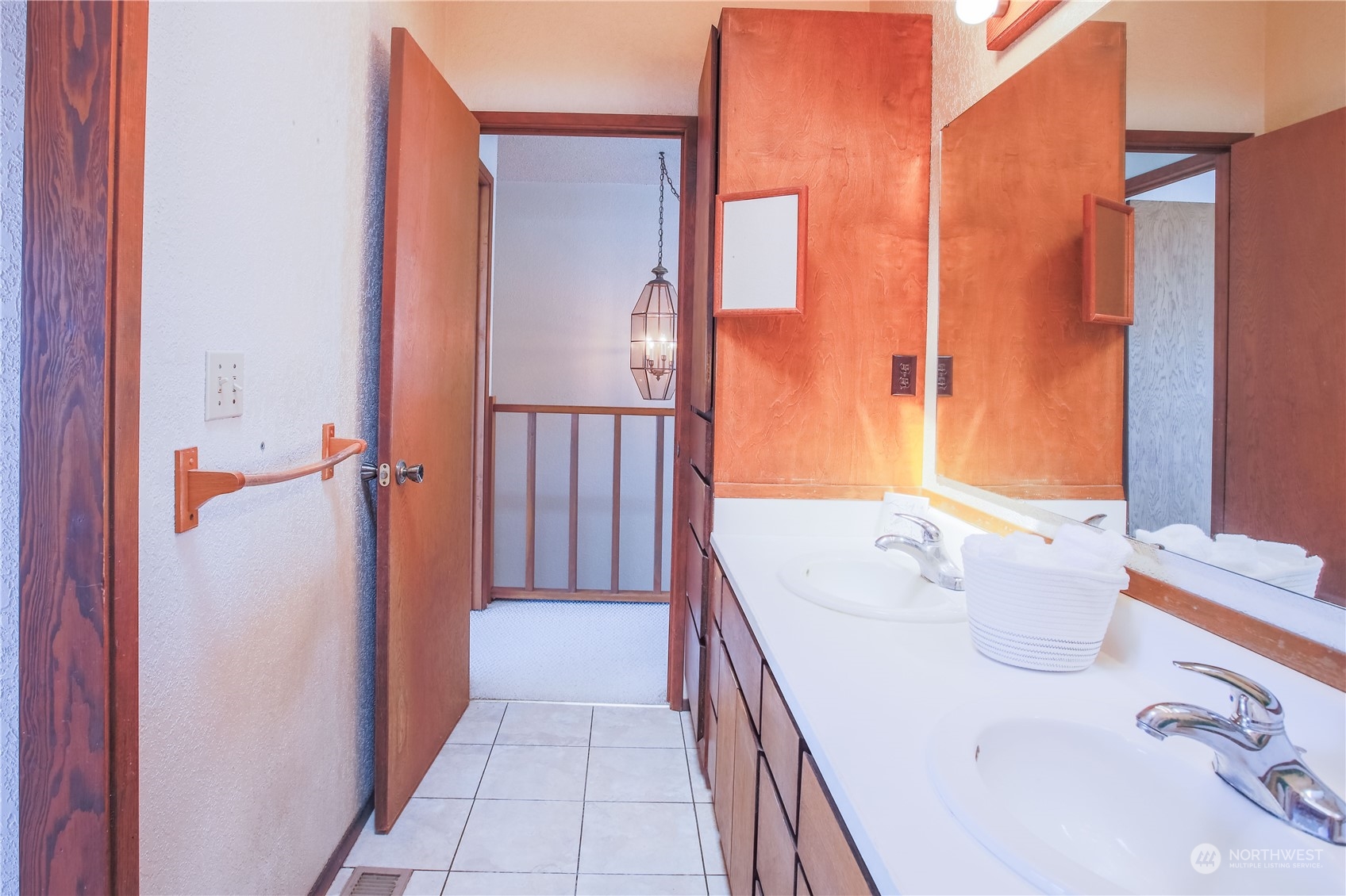 8168 Cultus Bay Road Clinton, WA 98236 - Photo 24 of 38 a bathroom with a sink a toilet and shower