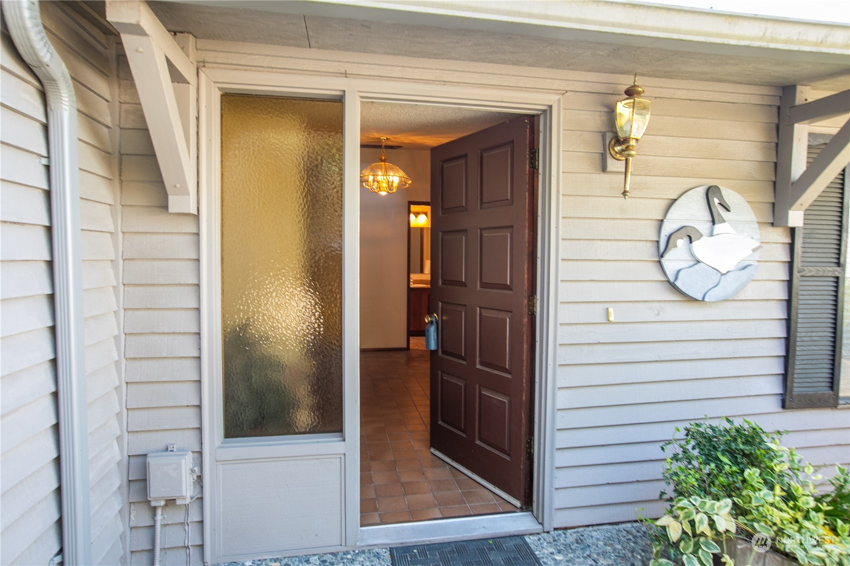 8168 Cultus Bay Road Clinton, WA 98236 - Photo 5 of 38 a view of front door and porch