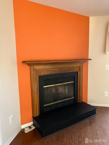 a stove top oven sitting inside of a kitchen