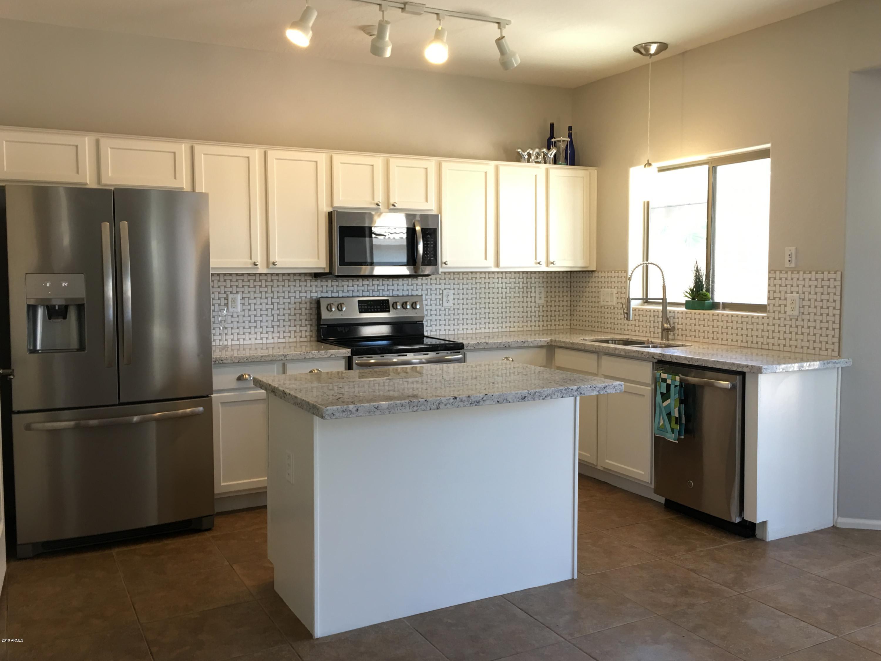 44886 West Zion Road Maricopa, AZ 85139 - Photo 3 of 24 F02D1F52-D8AC-478D-856B-1FDD7CFEC268
