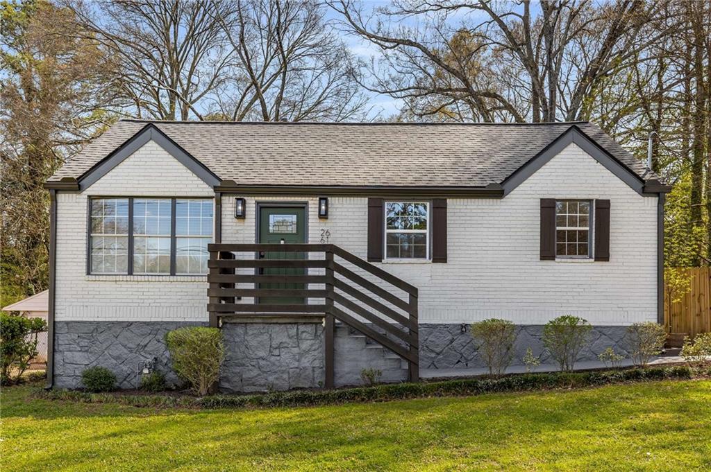 2661 Northview Avenue Decatur, GA 30032 - Photo 1 of 1 a front view of a house with a yard and garage