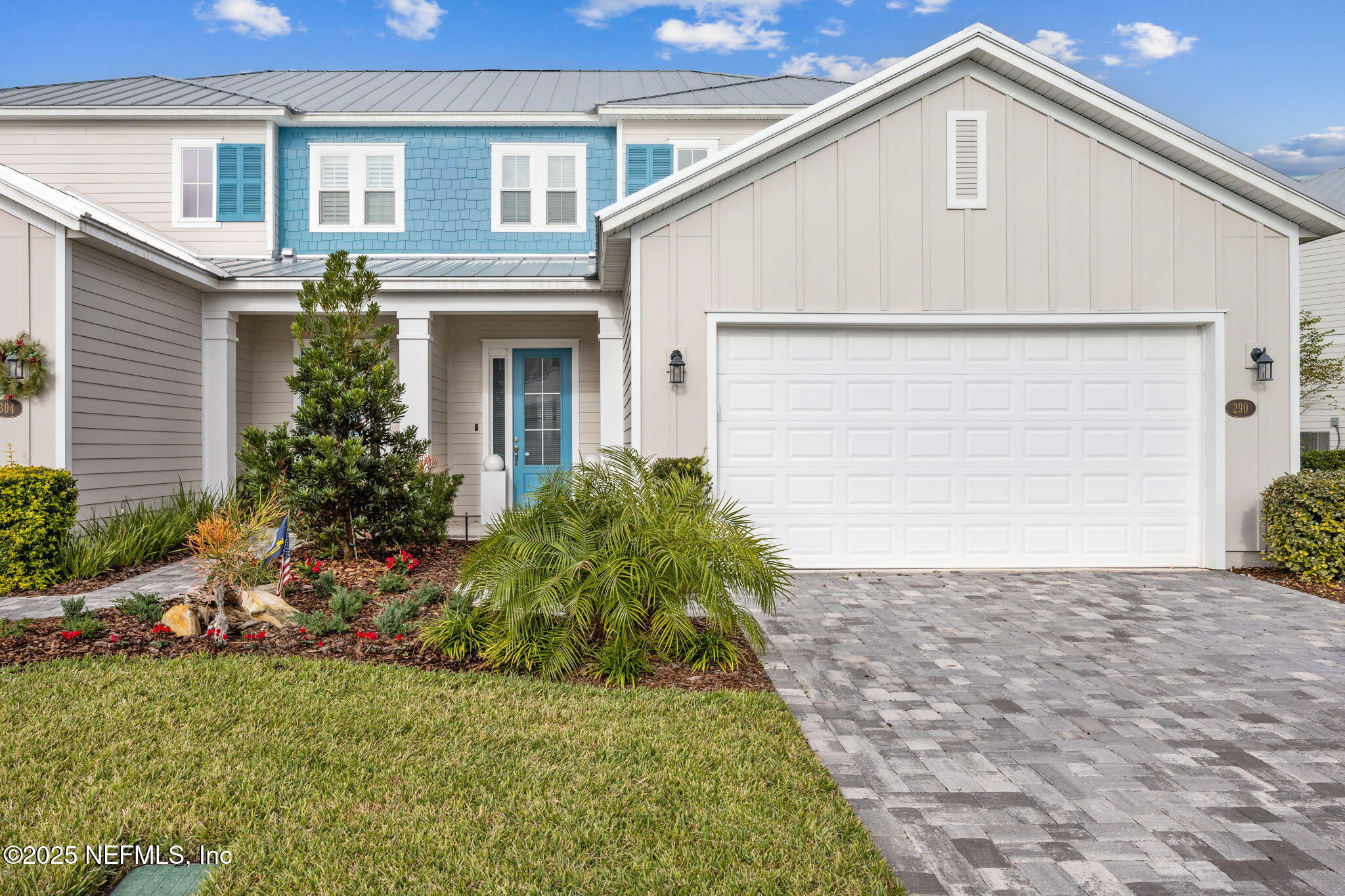 290 Rum Runner Way St. Johns, FL 32259 - Photo 2 of 105 a front view of a house with garden