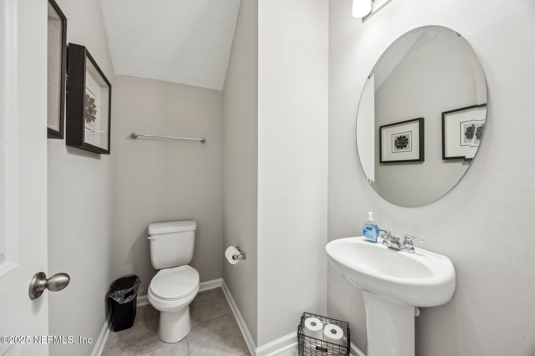 290 Rum Runner Way St. Johns, FL 32259 - Photo 22 of 105 a bathroom with a toilet sink and mirror