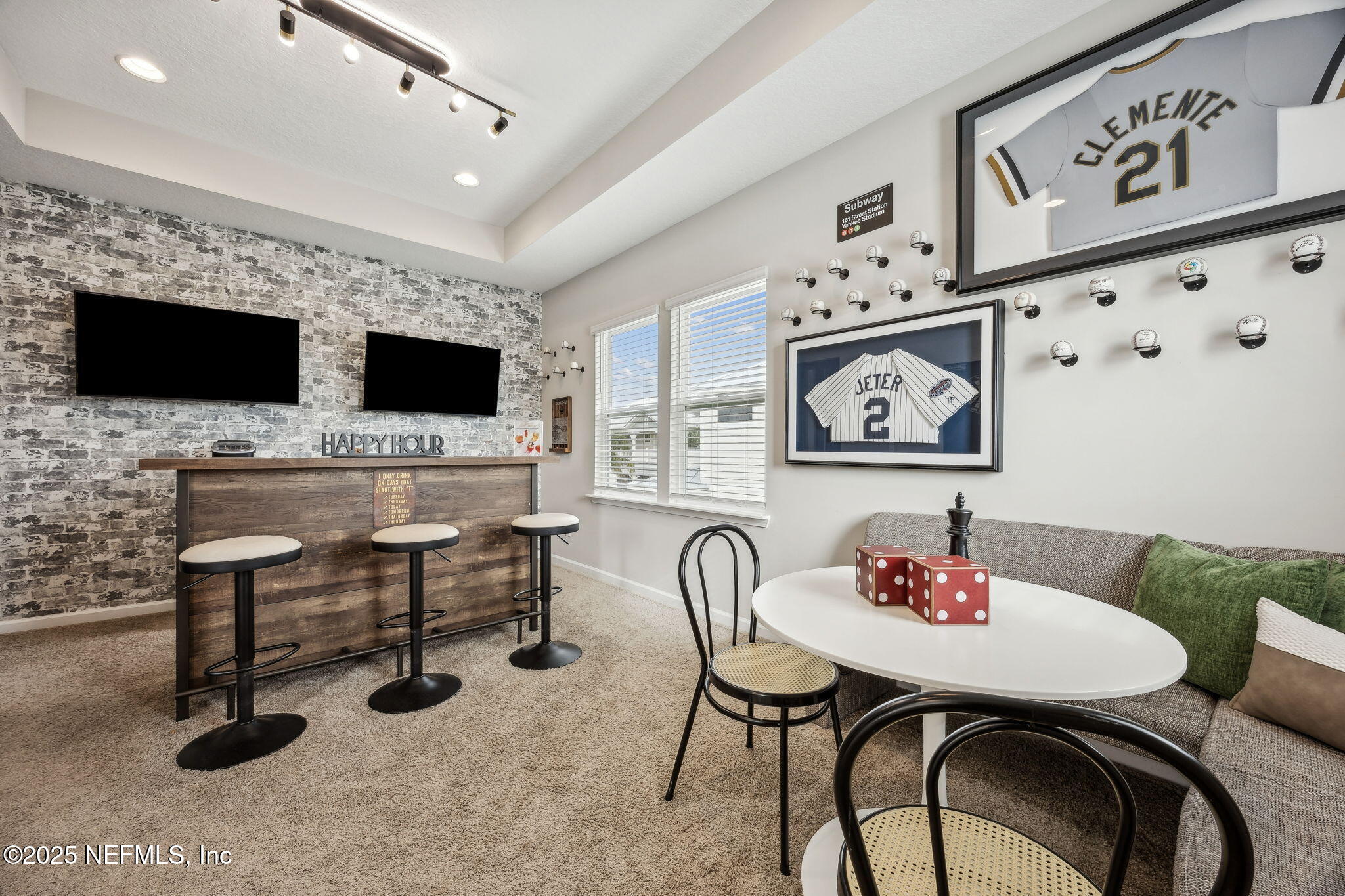 290 Rum Runner Way St. Johns, FL 32259 - Photo 24 of 105 a view of a livingroom with furniture and a flat screen tv