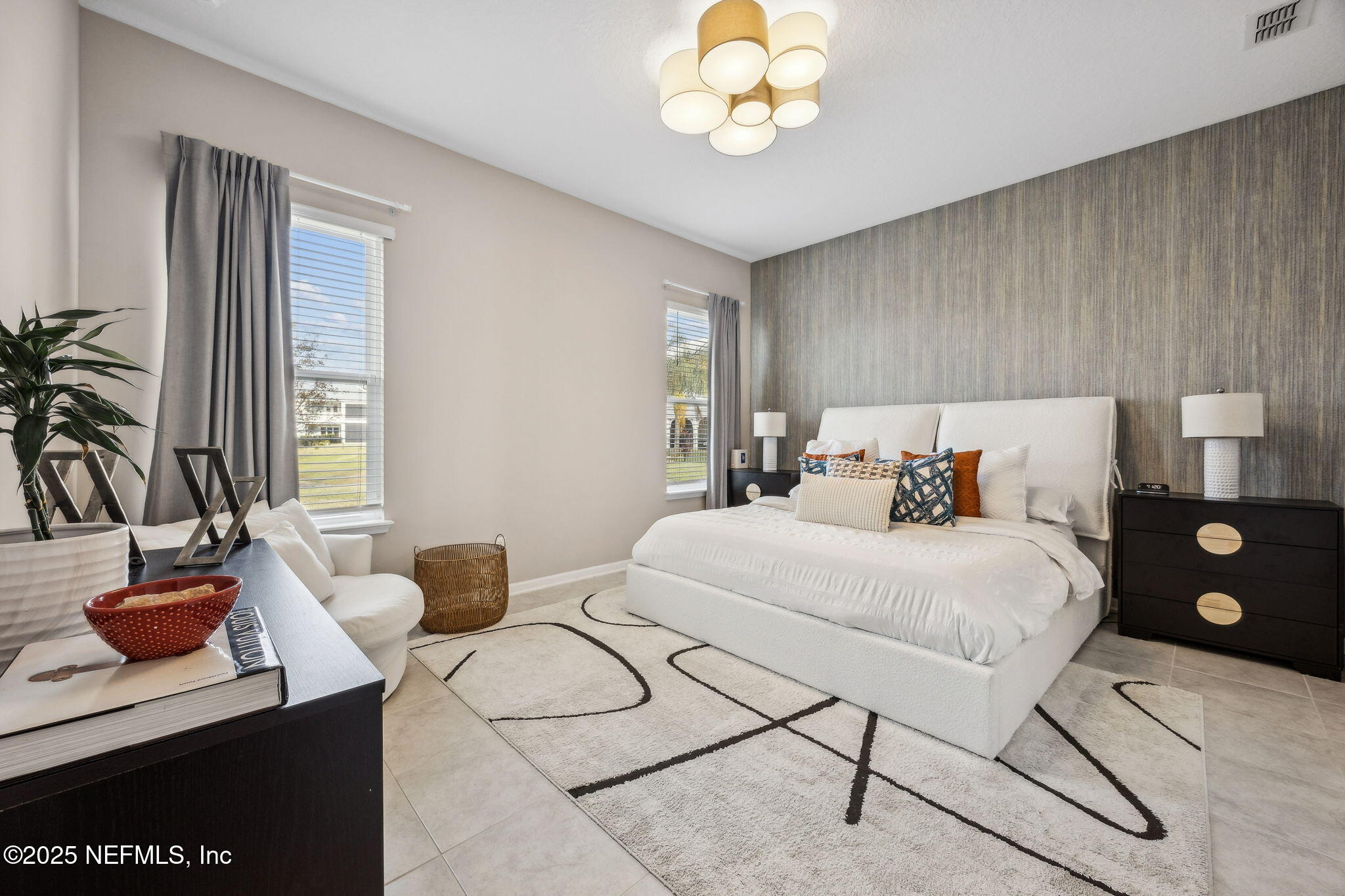 290 Rum Runner Way St. Johns, FL 32259 - Photo 28 of 105 a bedroom with a bed and a table with mirror