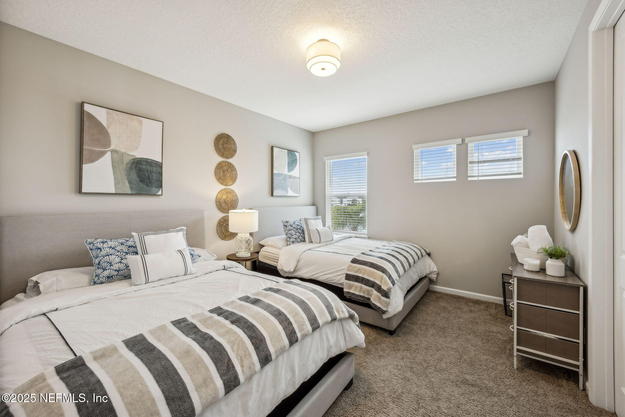 290 Rum Runner Way St. Johns, FL 32259 - Photo 37 of 105 a bedroom with two beds and a window