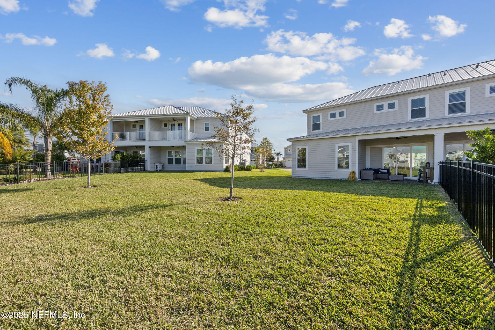 290 Rum Runner Way St. Johns, FL 32259 - Photo 45 of 105 a view of a house with a big yard and potted plants