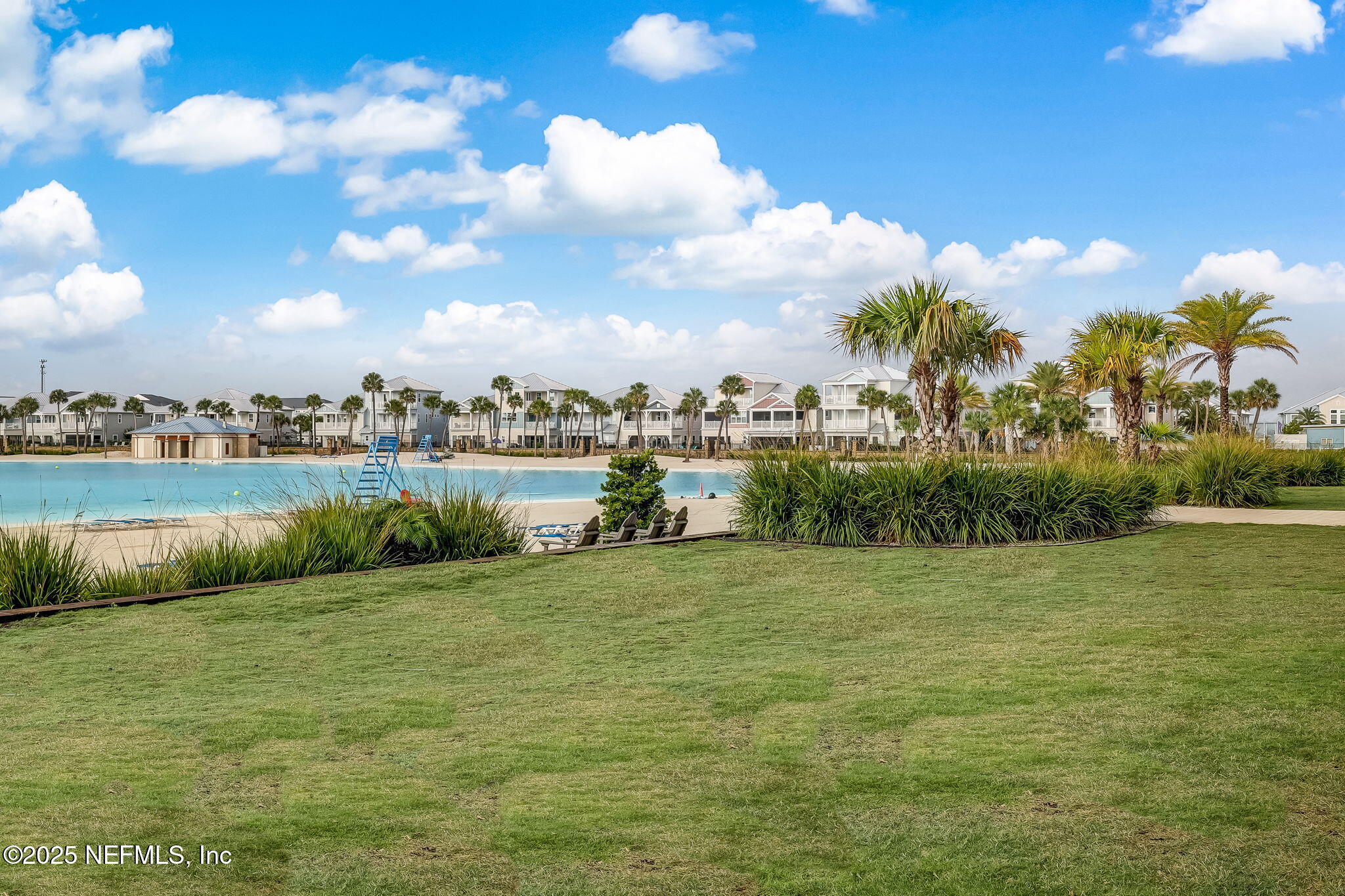 290 Rum Runner Way St. Johns, FL 32259 - Photo 59 of 105 a view of a lake with houses in the back