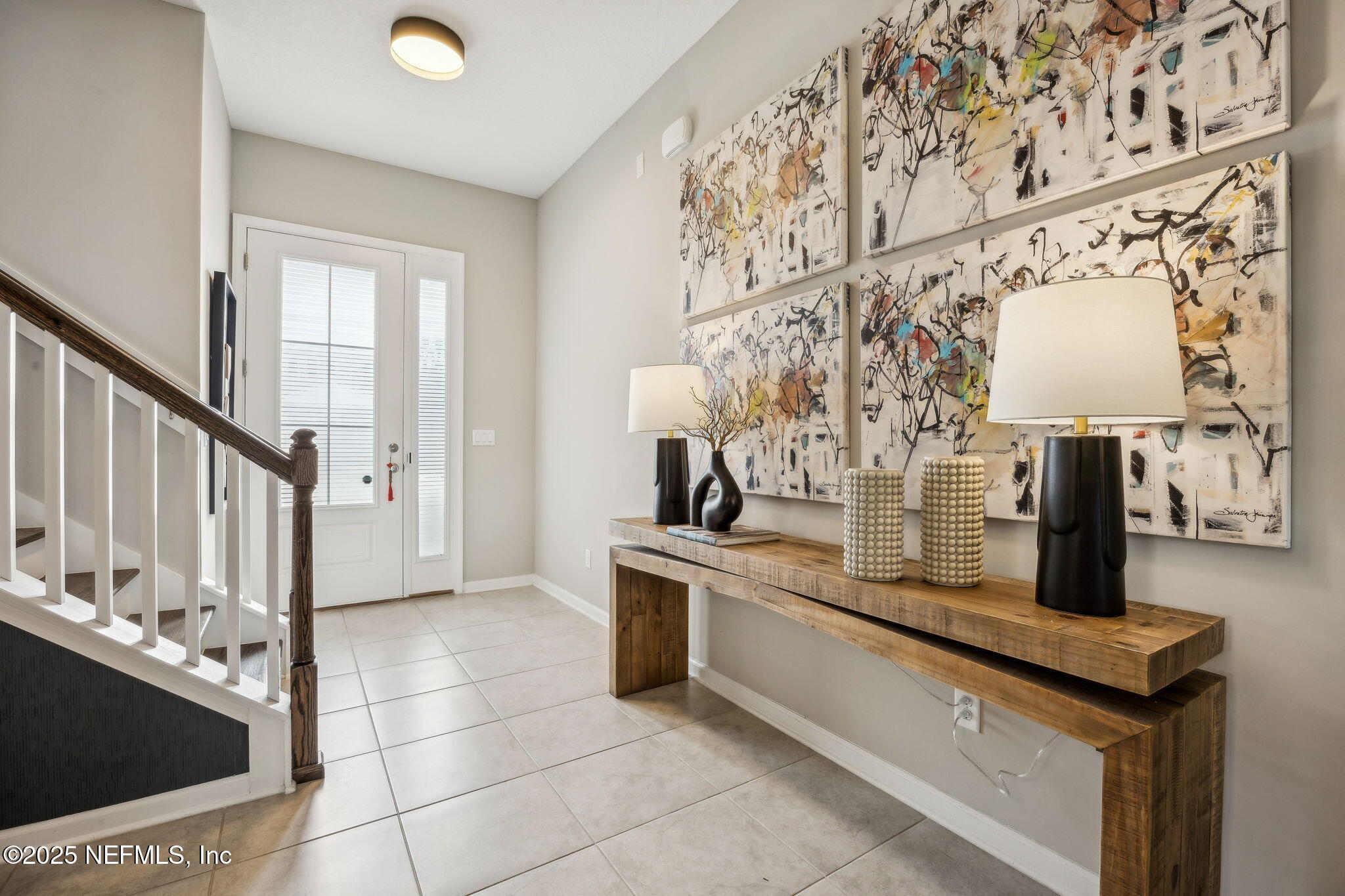 290 Rum Runner Way St. Johns, FL 32259 - Photo 9 of 105 a kitchen with stainless steel appliances a sink and a stove