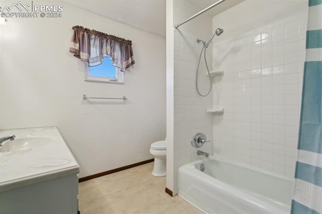 519 Dakota Avenue Simla, CO 80835 - Photo 20 of 27 a bathroom with a sink a toilet and shower