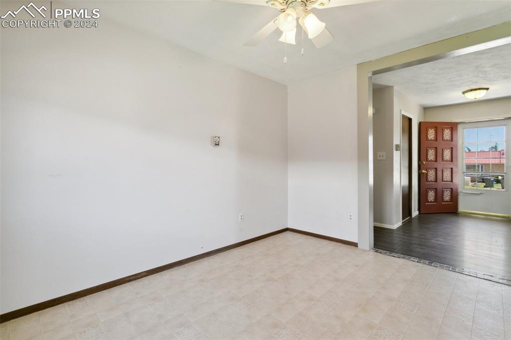 519 Dakota Avenue Simla, CO 80835 - Photo 9 of 27 an empty room with chandelier fan