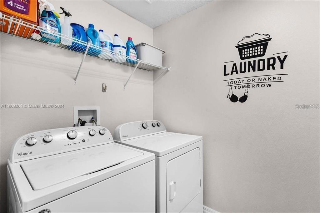 11819 Vermillion Avenue Windermere, FL 34786 - Photo 20 of 25 a utility room with dryer and washer