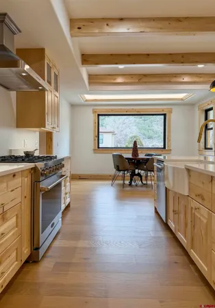 a bedroom with a bed and a table