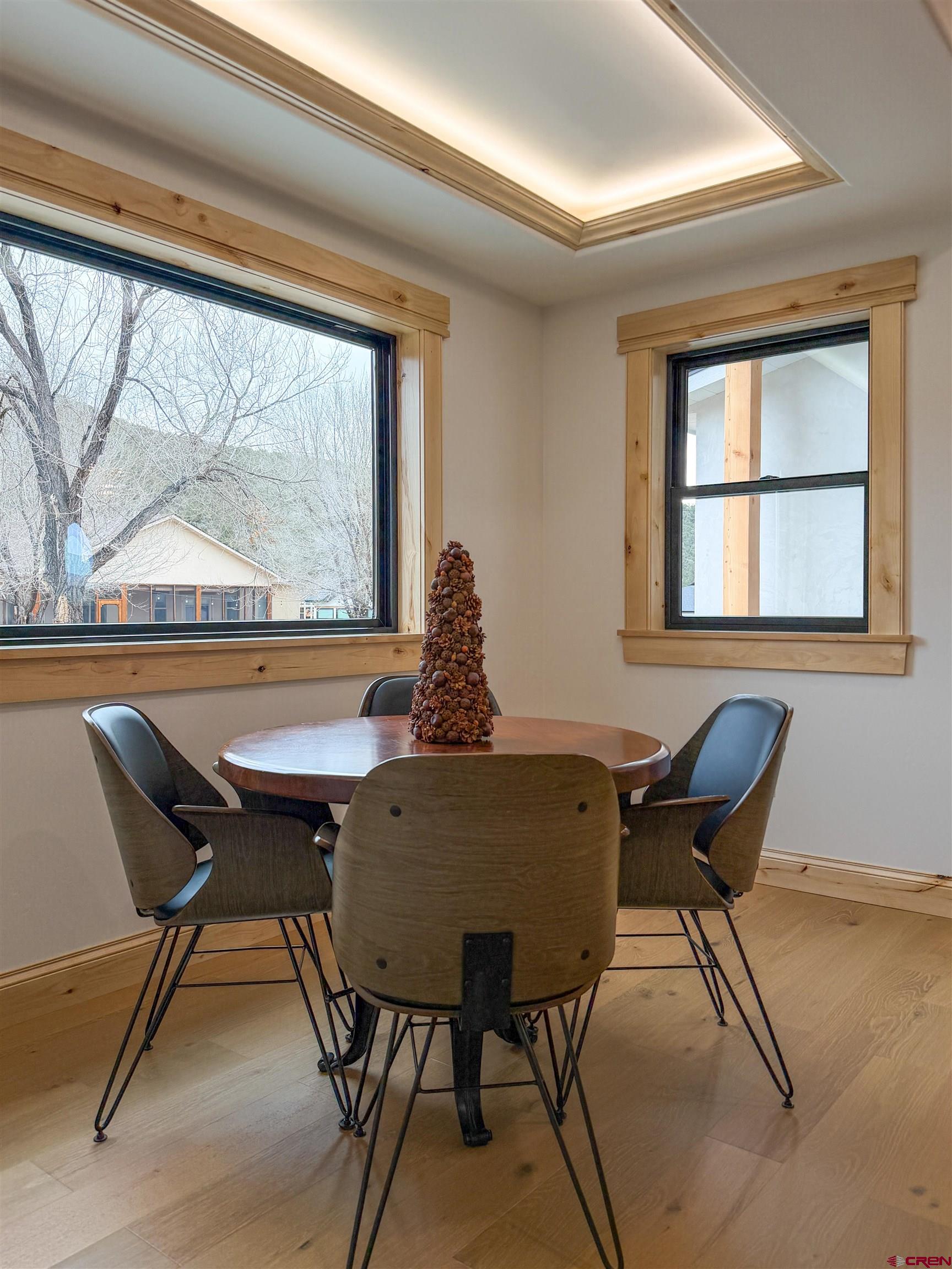 805 Southeast Pinyon Street Cedaredge, CO 81413 - Photo 21 of 45 a view of a dining room with furniture window and outside view