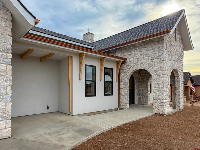 a front view of a house with a balcony