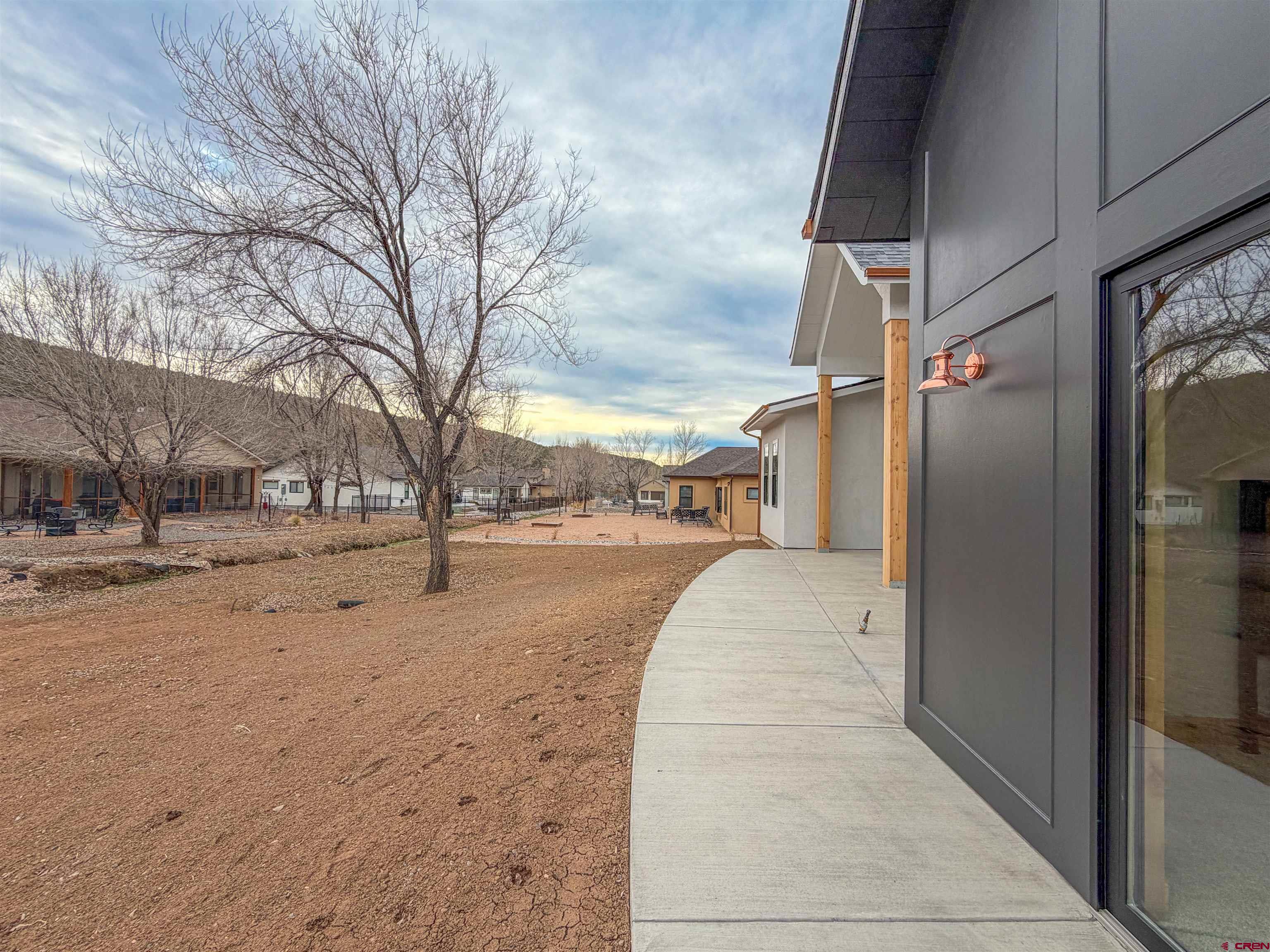 805 Southeast Pinyon Street Cedaredge, CO 81413 - Photo 39 of 45 a view of road and trees