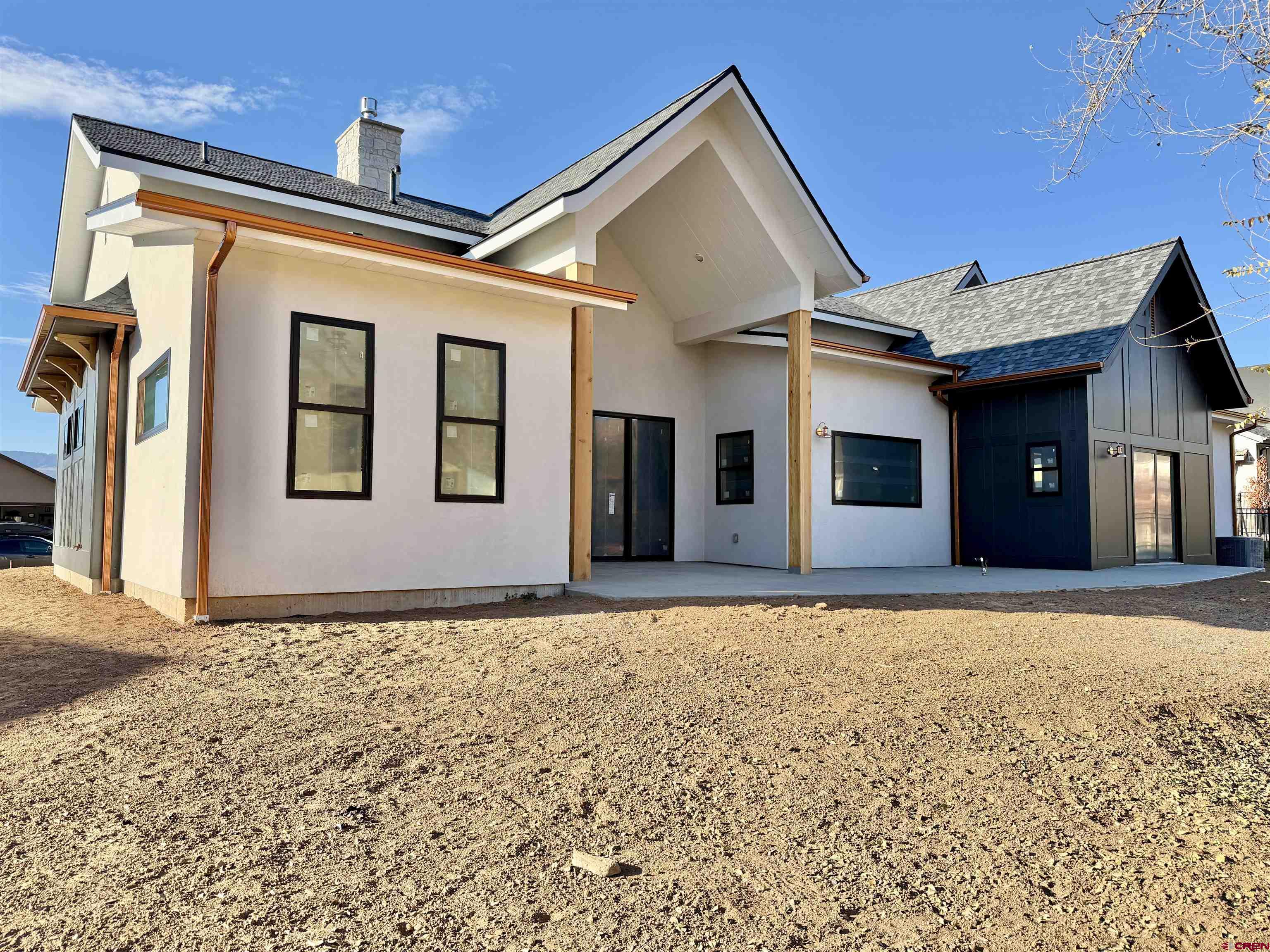 805 Southeast Pinyon Street Cedaredge, CO 81413 - Photo 44 of 45 a front view of a house with windows