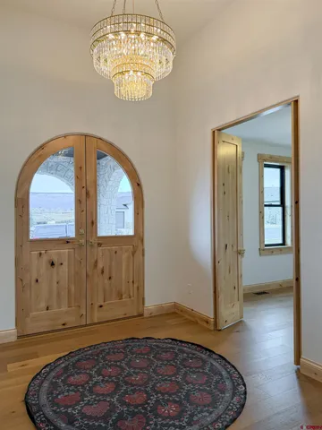 a kitchen with stainless steel appliances granite countertop a refrigerator and a stove