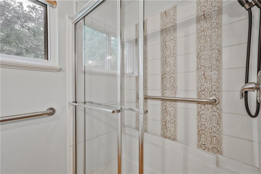 3225 Spring Drive Northwest Atlanta, GA 30360 - Photo 21 of 28 a bathroom with a shower