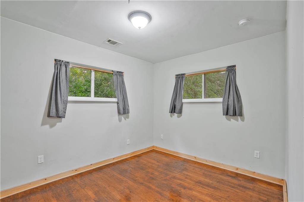 3225 Spring Drive Northwest Atlanta, GA 30360 - Photo 23 of 28 an empty room with a window